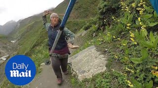 Angry Nepalese woman chases British family on Annapurna Circuit  Daily Mail [upl. by Igenia]