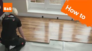 How to lay flooring part 3 laying locking laminate [upl. by Ahsart144]