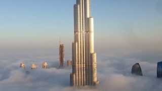 Burj Khalifa and Dubai Downtown are raising from the fog [upl. by Rather]