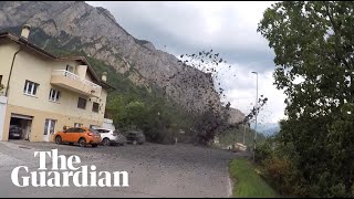 Mudslide sweeps into Swiss village [upl. by Igiul731]